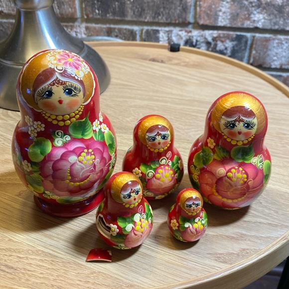 Russian Wooden Kachina Stacking dolls. Four stack in main doll. One flaw shown - Picture 9 of 11